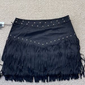 Black fringe skirt. Brand new with tags. Bought to wear at the NFR and didn’t.